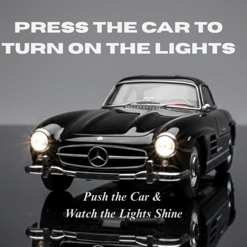 Black die cast classic car showing press to turn on lights feature with text instruction
