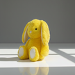 Claptales yellow bunny soft toy 30 cm shown on plain background with floppy ears