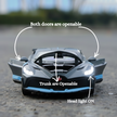 Front angle of grey die cast sports car on road with labels showing openable doors and headlights