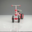 Front view of baby balance bike showing stable 4 wheel scooter design for kids
