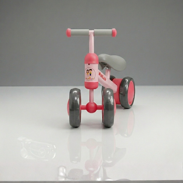 Front view of baby balance bike showing stable 4 wheel scooter design for kids