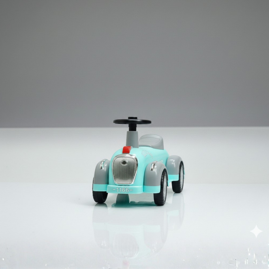 Front view of baby ride on car showing compact design and easy steering handle for toddlers