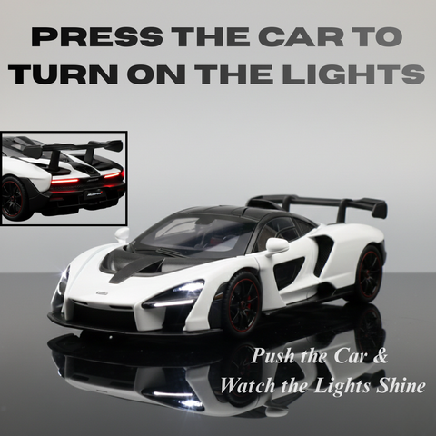 Model car with instructions to press it for lights on a reflective surface