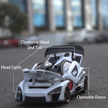 Model car with openable features on a blurred street background
