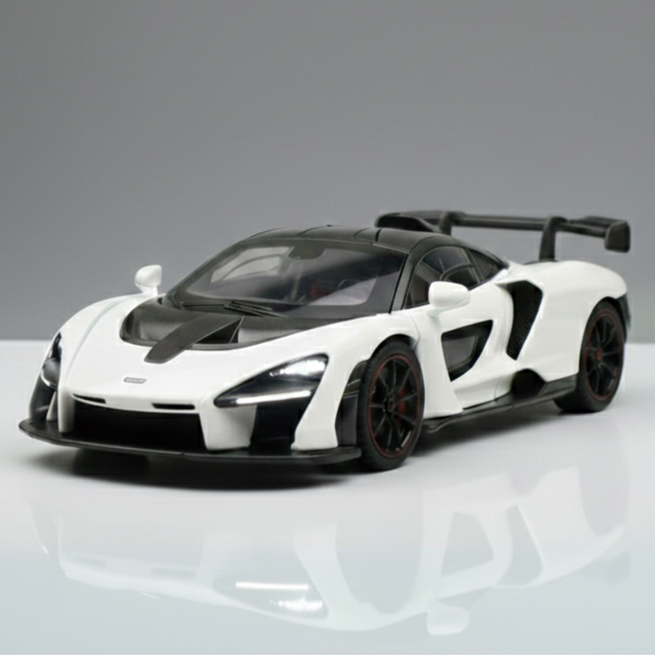 Model of a sports car on a reflective surface with a gray background