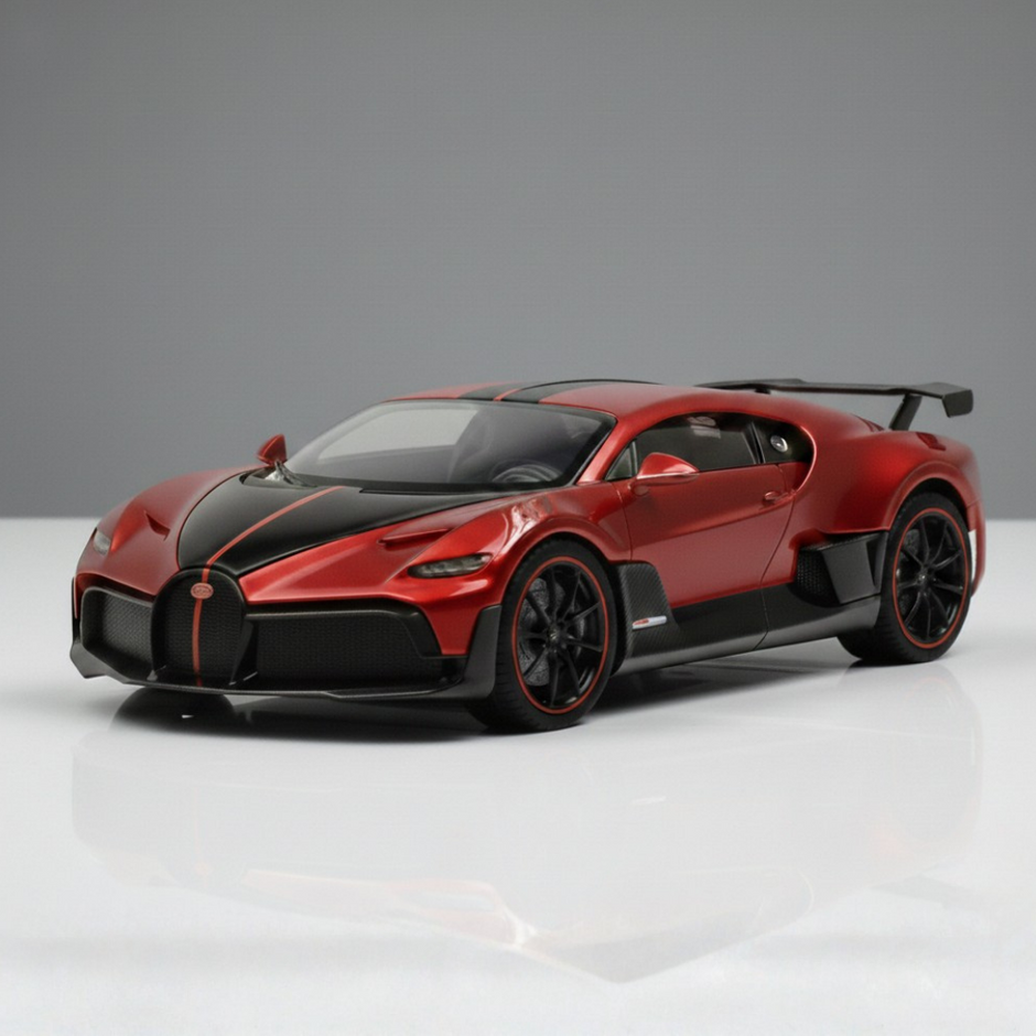 Red die cast sports car model on plain background used as design reference