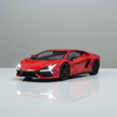 Red sports car model on a reflective surface with a gray background