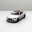 white sports coupe die cast model car 1:24 scale front view metal toy
